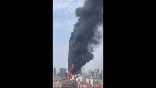 CHINA has MAGIC Buildings - THEY catch FIRE, but Don't FALL DOWN