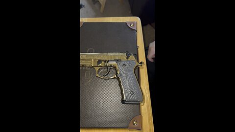 Gold and engraved gun is definitely bad ass