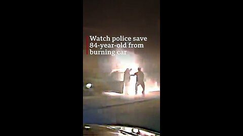 Police dashcam captures moment officers save 84-year-old from burning car
