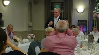Father of the bride's surprise Elvis performance
