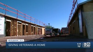 Carpenters volunteer to help homeless female veterans