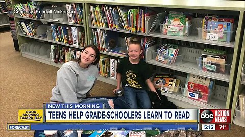 Strawberry Crest High School students help kids in elementary school next door learn to read