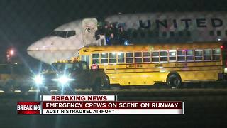 Plane slides off runway at Austin Straubel Airport
