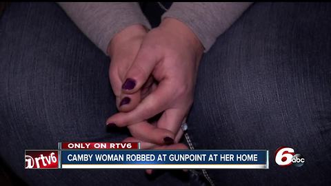 Woman held at gunpoint, locked in bathroom while thieves ransacked her homeo