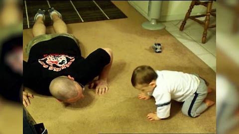"Adorable Baby Loves Doing Push Ups"