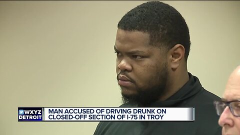 Man accused of driving drunk on closed-off section of I-75 in Troy with child in back seat