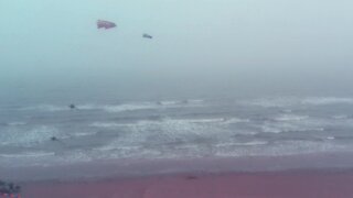Drone footage captures kite flying on a foggy day in Texas
