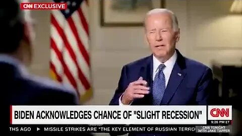 Joe Biden drops his cheat sheet during his interview with CNN's Jake Tapper