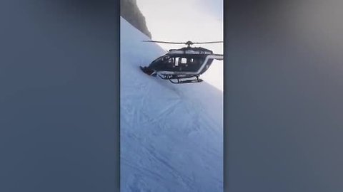 Helicopter pilot pulls off incredible landing to rescue injured skier on snow mountain in the French Alps