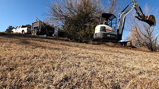 The Bocat E35 mini-excavator in action! Man and machine.