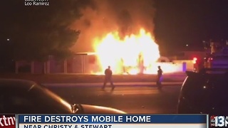 UPDATE: Neighbors blame mobile home fire on squatters