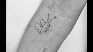 Chrissy Teigen reveals new tattoo drawn by her daughter