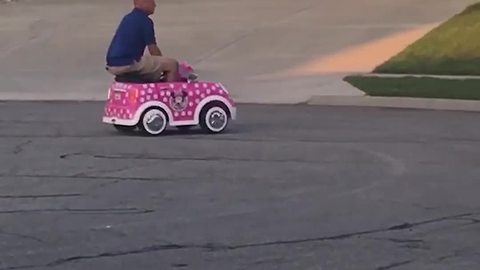 Dad Is Rolling Hard in His Daughter's New Pink Toy Car