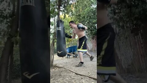 Beginner Exercising On Heavy Bag