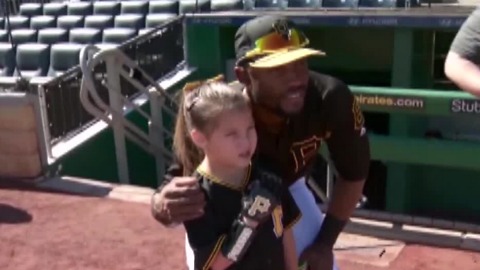 Las Vegas girl throws first pitch at Pirates game