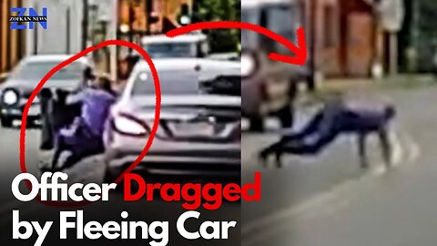Moment a Police Officer Is Dragged Away by Getaway Car