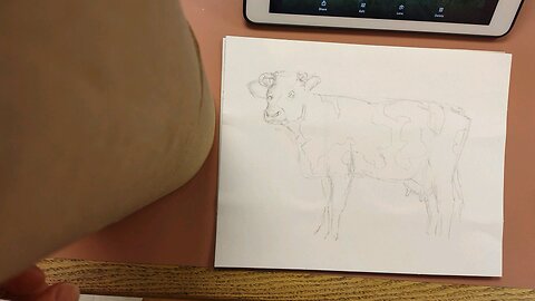 drawing a quick cow for one of the 2nd grade students