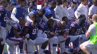 Several Bills players protest during Sunday's national anthem
