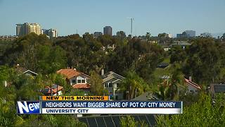 Neighbors split over pot of city money