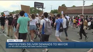 Protesters deliver demands to mayor