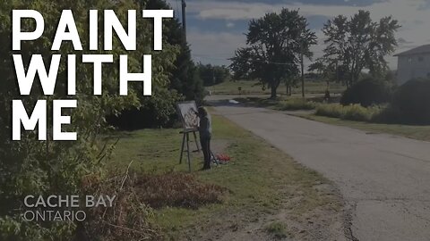 Painting in front of an abandoned church