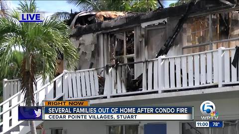 Residents work to salvage items after massive Stuart condo fire