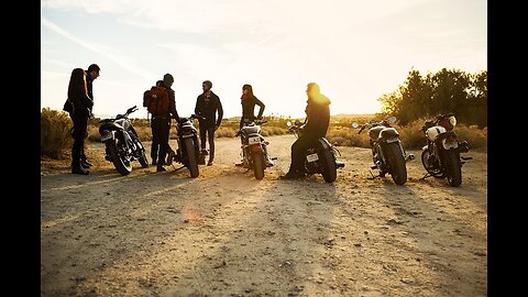 Bikers ride out. Rainy peaks.