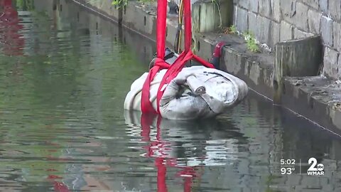 Christopher Columbus statue being retrieved from Baltimore's harbor