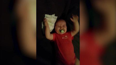 Baby Giggles When Dad Throws Diaper At Her