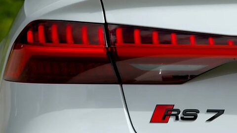 White Audi RS7 Sportsback and red RS7 34 minutes of RS power