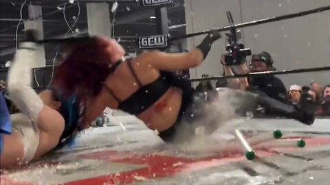 sera_risa slams mashaslamovich into glass at GCW's