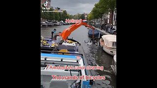 Amsterdam canal cleaning