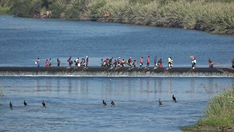 Bizzarro World: Haitians Cross Back and Forth Over Texas Mexico Border