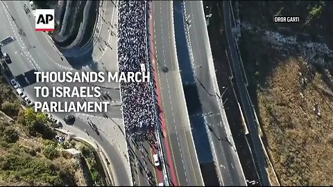 Thousands march to Israel's Parliament