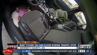 Man stopped for driving with baby on lap