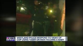 Video shows a father being tased by Westland police as he holds his baby