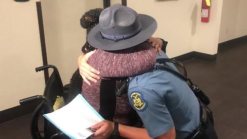Woman reunites with MHP trooper who saved her