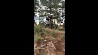 Hitting a drop with my mountain bike