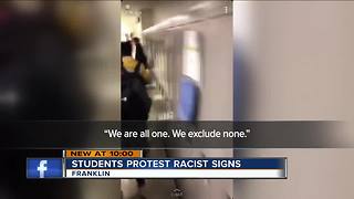 Students march for inclusion following racist water fountain signs