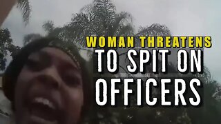 Woman Threatens To Spit On Officer