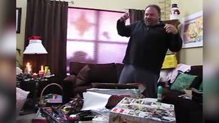 "Christmas Prank: A Man Opens A Christmas Present, And It’s Full Of 'Party Popper'"