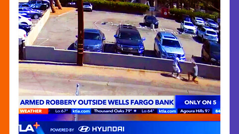 Bank Teller Tipping Off Robbers