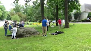 Orchestra plays and sings together to congratulate its oldest member