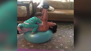 Baby Distracts Mom From Workout