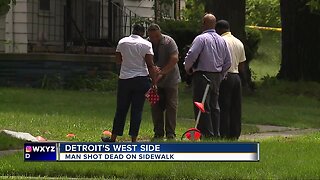 Man shot dead on the sidewalk