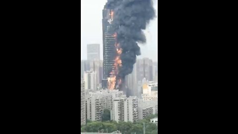 This entire building is on fire in China but it did not fall like the twin towers…hmmm