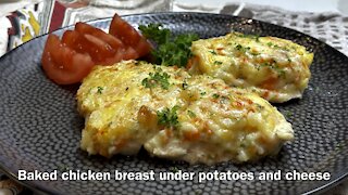 Tender and juicy Chicken breast under potatoes and cheese