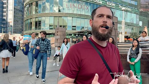 Crowds hear about Jesus at the tram stop in Oslo (My favorite preaching segment in Norway)