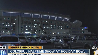 Colorful halftime show at Holiday Bowl