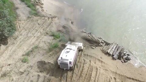 Russia is clearing Mariupol. Beach of mines that were left by the Ukraine forces.